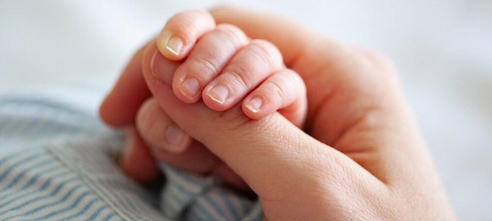 What is the Newborn Grasp Reflex