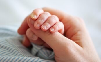 What is the Newborn Grasp Reflex